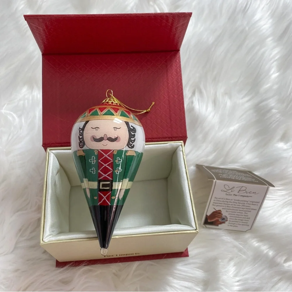 Li Bien Pier 1 Nutcracker Glass Ornament 2017